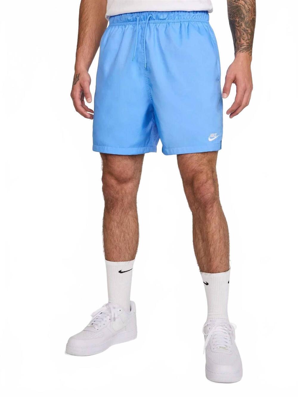 NEW NIKE woven flow shorts in university blue